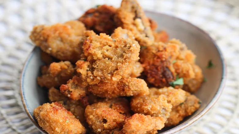 breaded fried mushrooms on plate