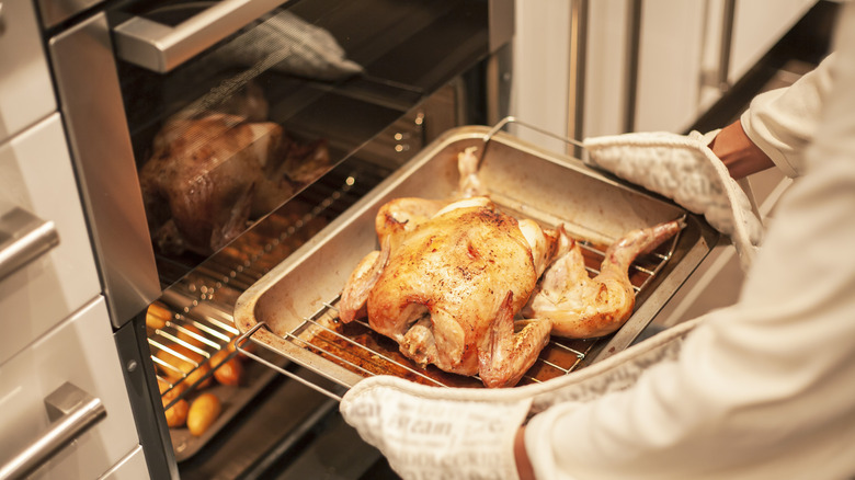 roasting chicken in a pan