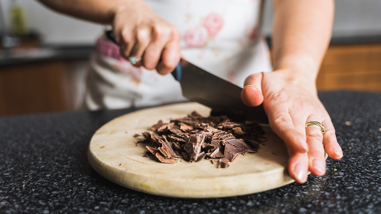 woman chopping chocolate