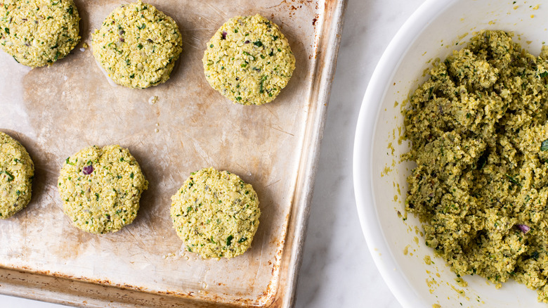 falafel patties on baking sheet