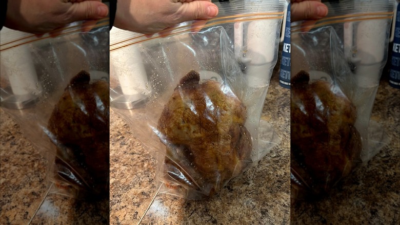 Rotisserie chicken in plastic bag