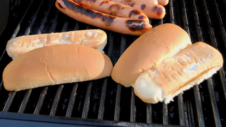 Hot dog buns on grill