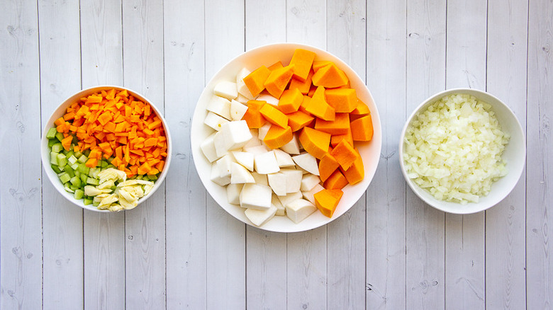 bowls of diced vegetables