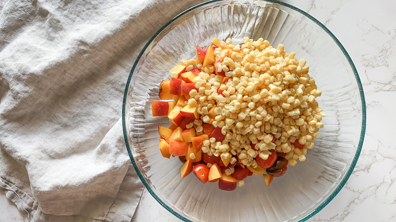 bowl with tomatoes, peaches, corn