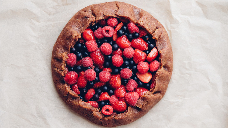 Mixed berry galette on brown paper