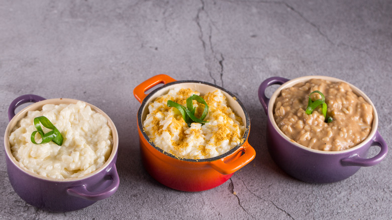 assorted risotto in colorful dishes