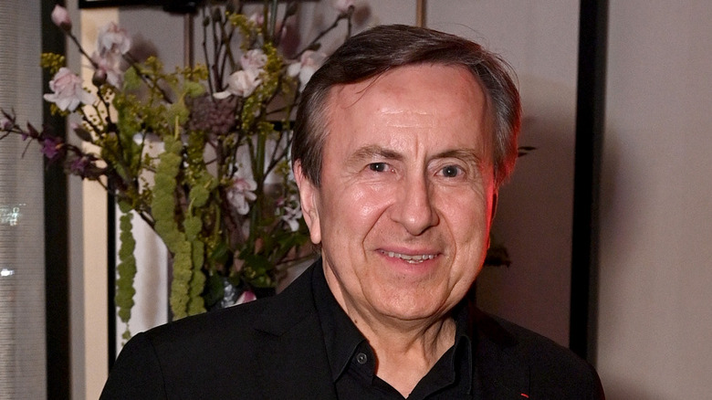 Daniel Boulud smiling in black suit