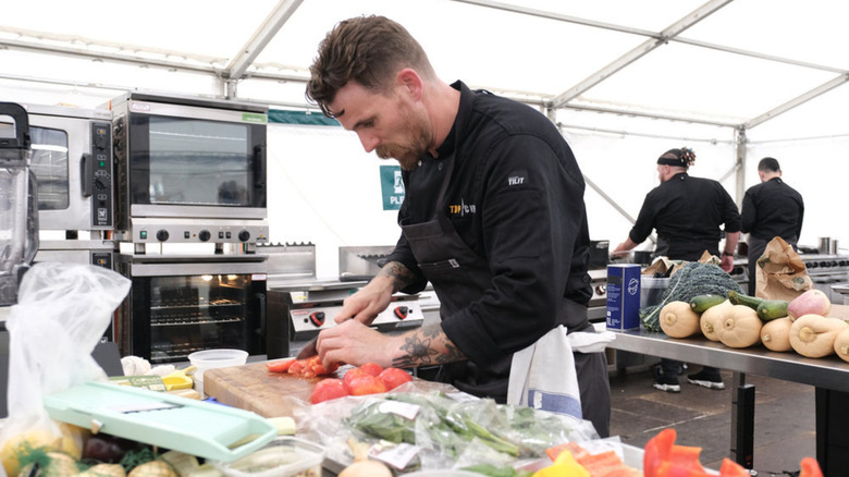 Dale MacKay chopping tomatoes