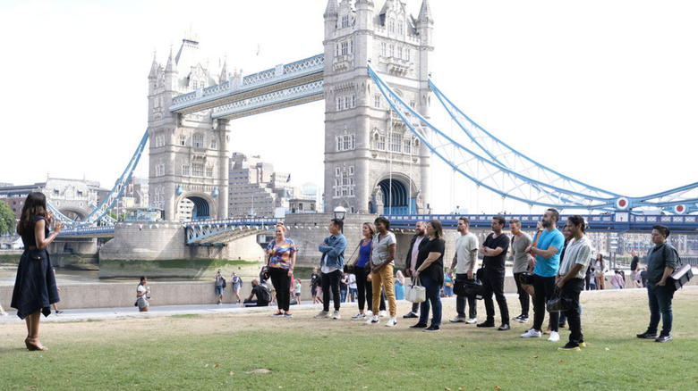 Top Chef contestants posing in front of London Bridge