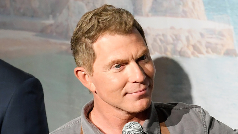 Bobby Flay with a hand on his hip