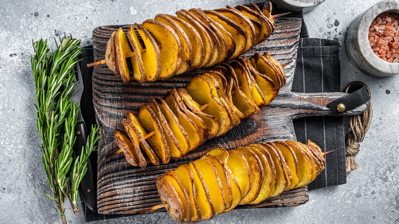 three tornado potatoes on cutting board