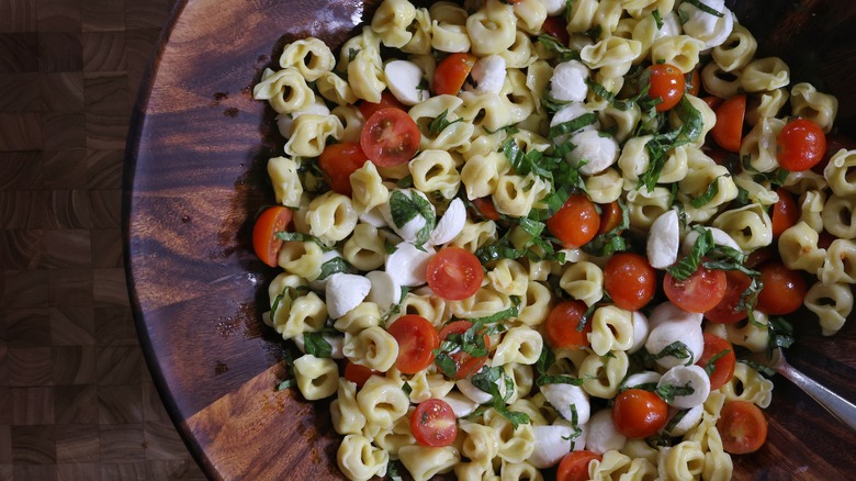 bowl of tortellini caprese pasta salad