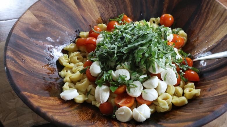 tortellini with tomatoes, mozzarella, and basil