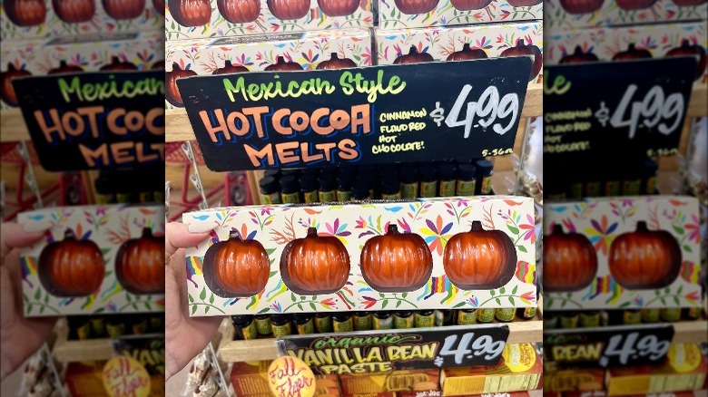 Person holding a package of Mexican-style Hot Cocoa melts from Trader Joe's