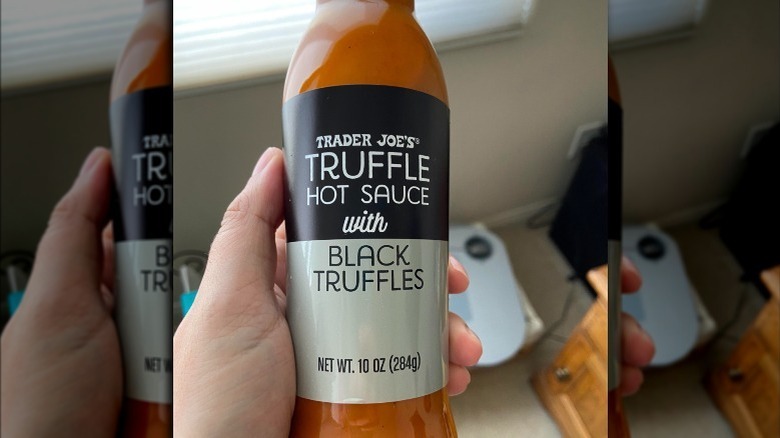 Truffle Hot Sauce in a hand