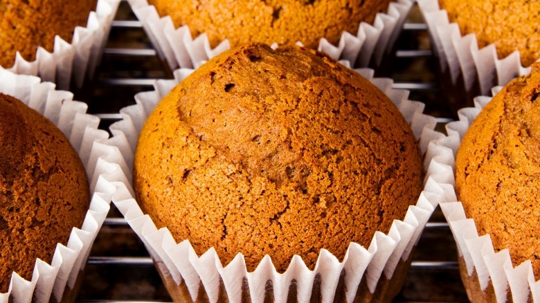 Pumpkin muffins cooling on rack