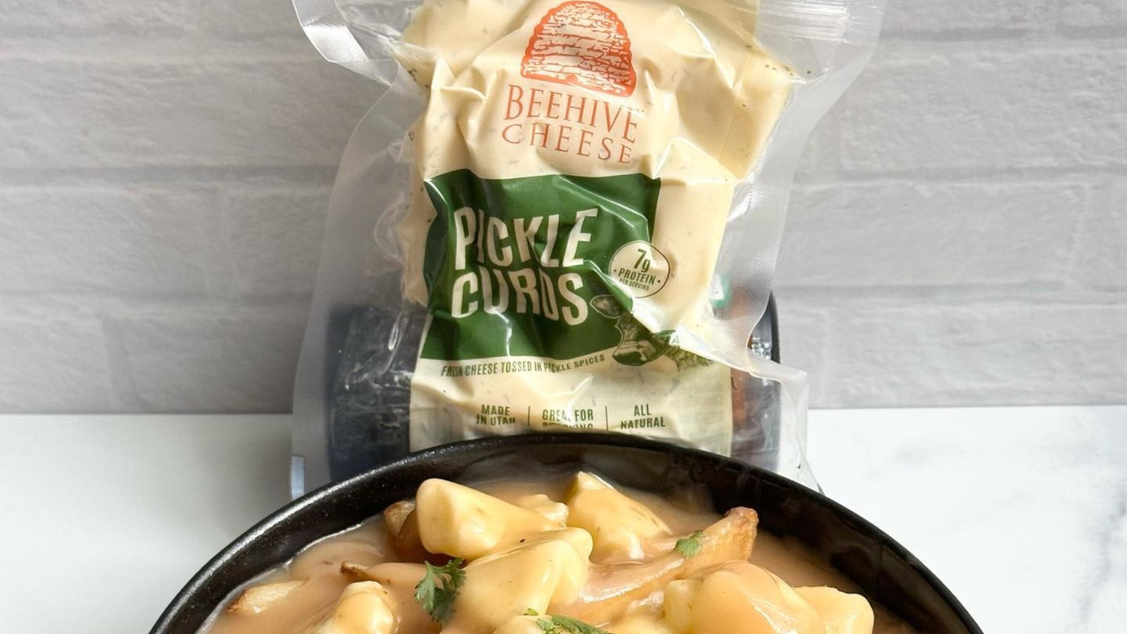 https://www.mashed.com/img/gallery/trader-joes-is-now-selling-tangy-pickle-cheese-curds/l-intro-1689387572.jpg