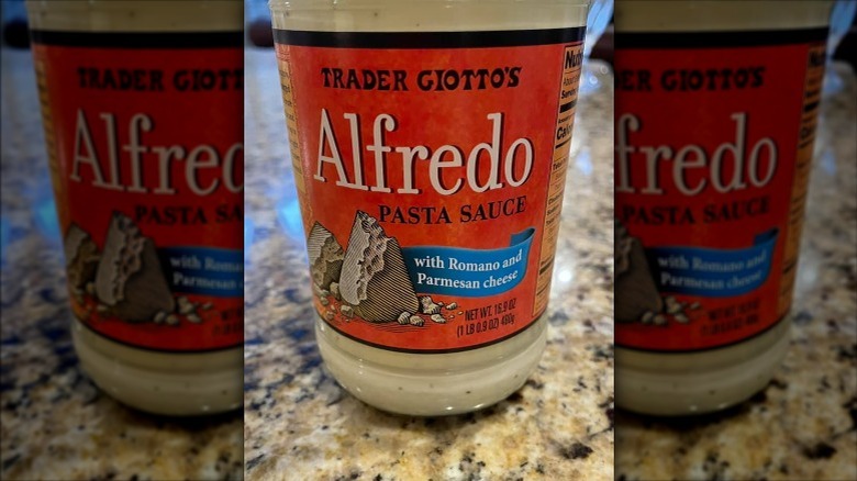 A jar of Trader Giotto's Alfredo Pasta Sauce