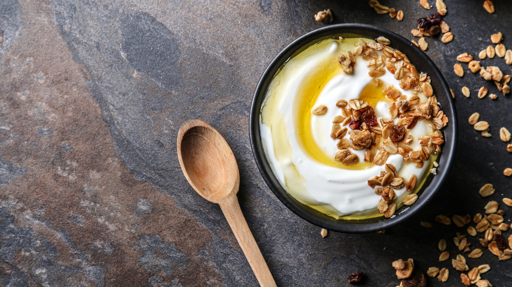 Bowl of yogurt with honey and granola