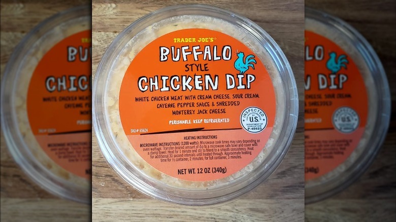 A container of buffalo-style chicken dip from Trader Joe's