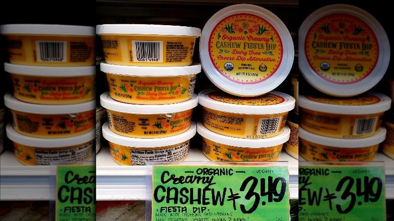 Several containers of a vegan cashew dip from Trader Joe's