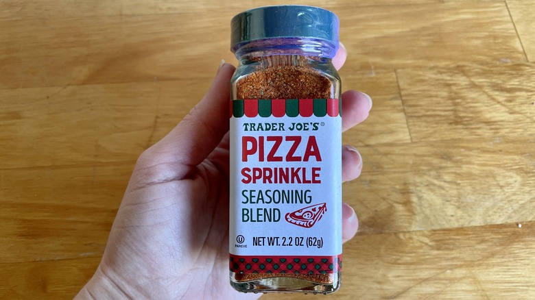 pizza sprinkles in hand