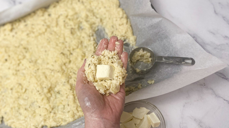 handful of risotto with mozzarella cube 