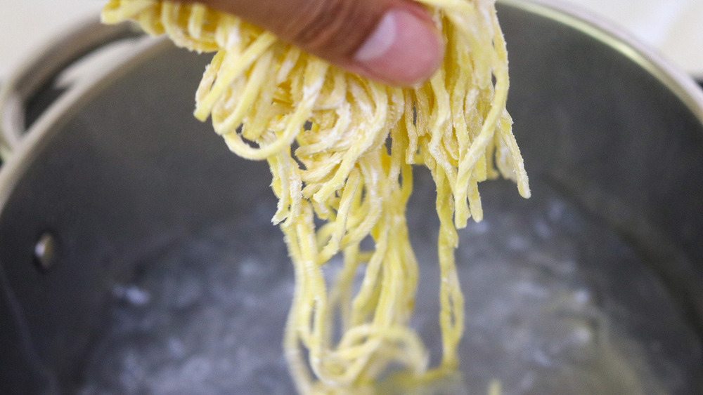 traditional Jajangmyeon noodles above pot