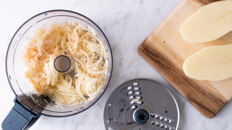 grated potatoes in a food processor