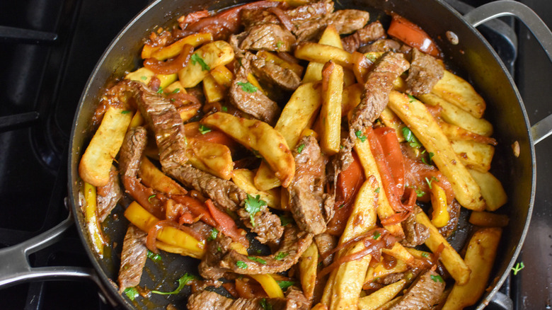 lomo saltado in a pan