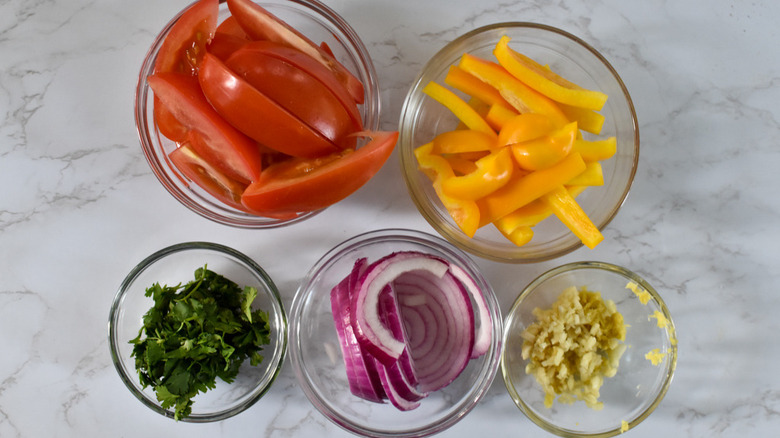 sliced veggies in cups