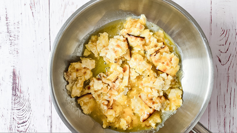 matzo brei cooking in pan