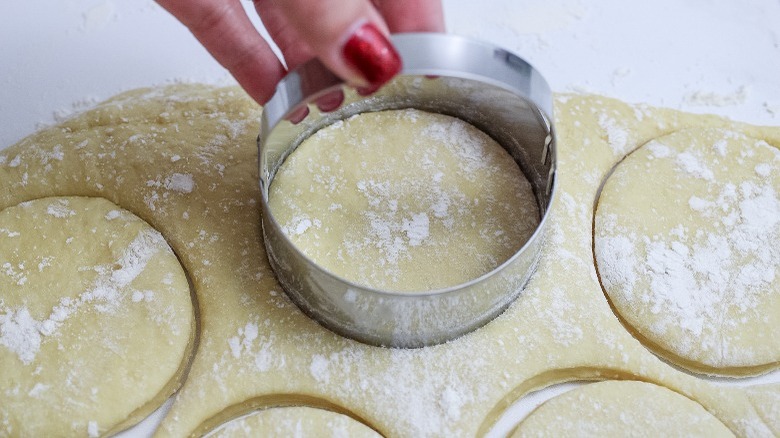 cutting out dough rounds