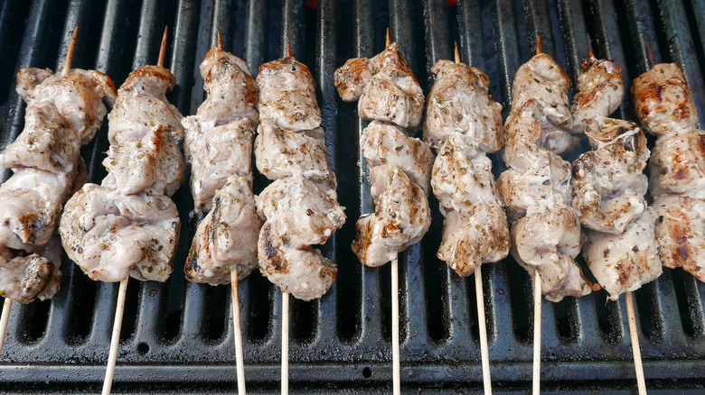 Pork souvlaki skewers on grill