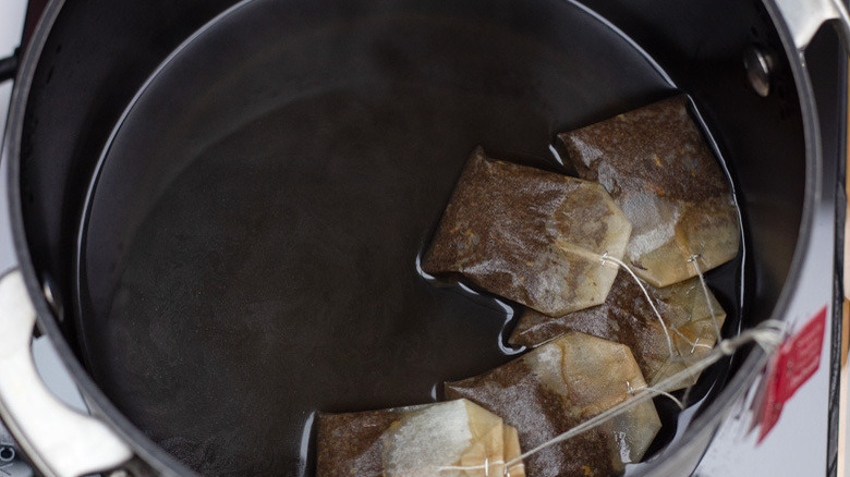 tea bags steeping in pot