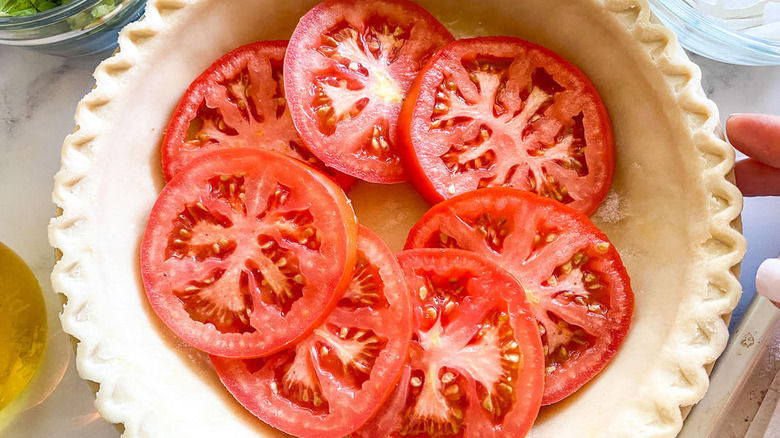 tomatoes arranged in pie crust