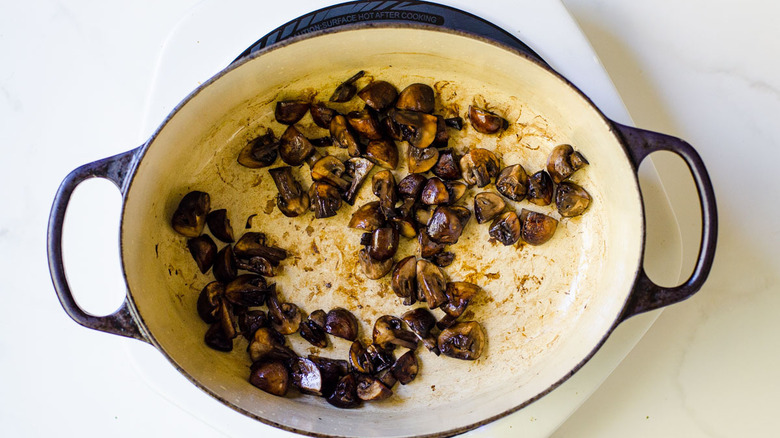 browning mushrooms in pan