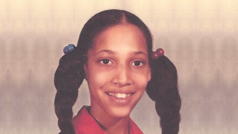 Young Carla Hall with pigtail braids