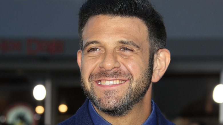 Adam Richman in a suit