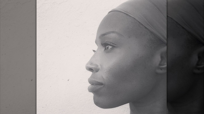 Black and white side profile of Lorraine Pascale