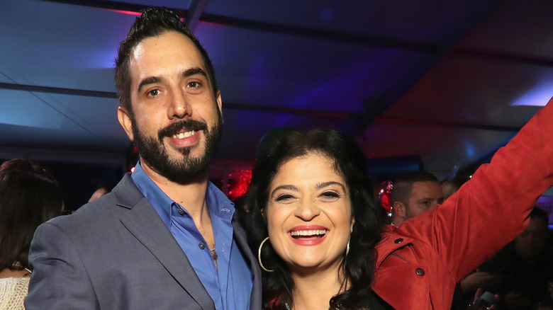 Alex Guarnaschelli smiling with ex-fiance Michael Castellon