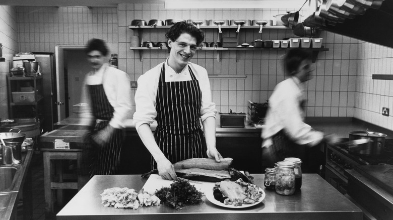 Young Marco Pierre White in kitchen