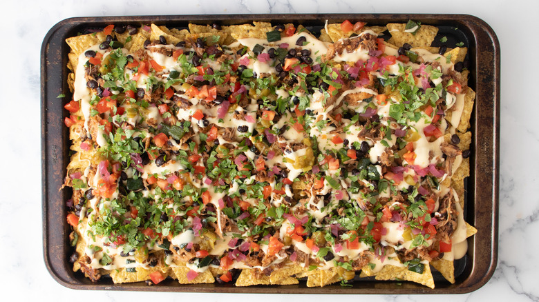 cheesy pork bean loaded nachos