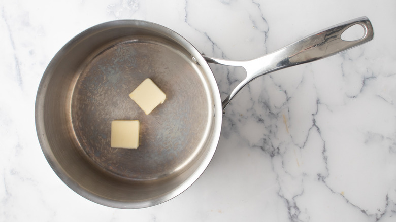 cubed butter in saucepan