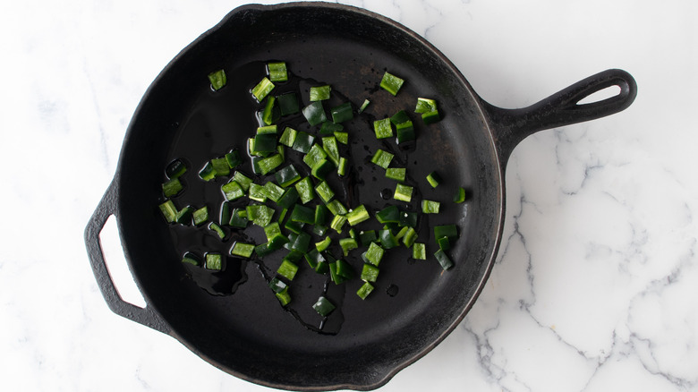 sauteeing poblano peppers in skillet