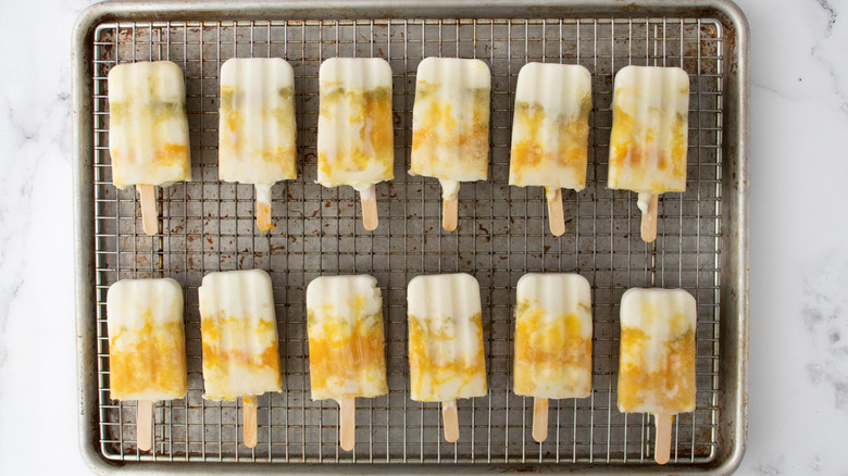 citrus yogurt popsicles on pan