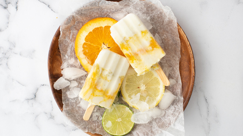 citrus yogurt popsicles on plate