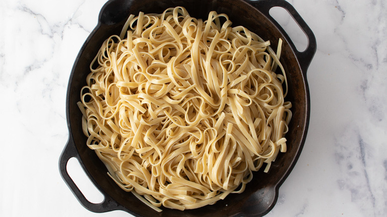 noodles in black pan