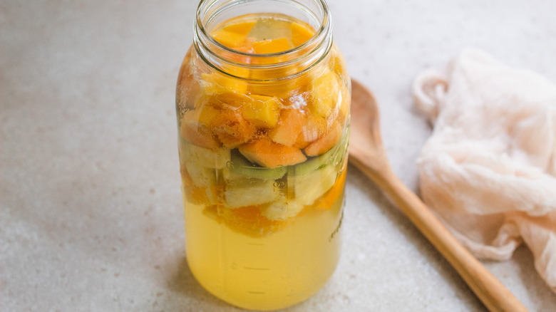 Glass jar filled with tropical sangria