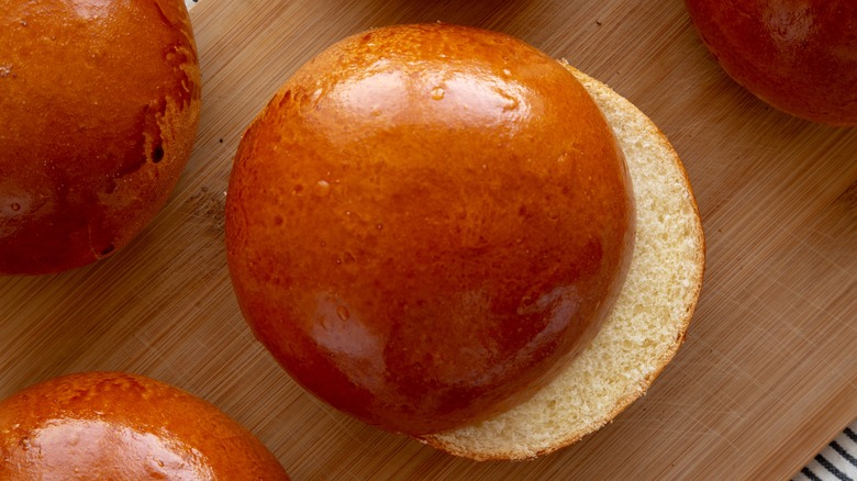 Brioche bun on cutting board